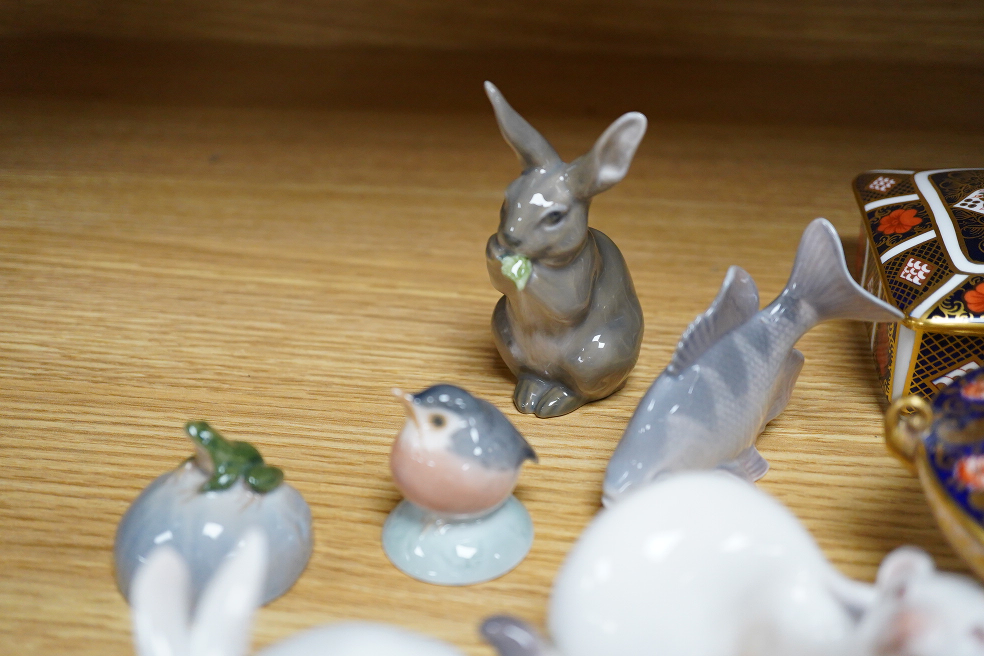 Six small Copenhagen figures, a Derby penguin and four other items